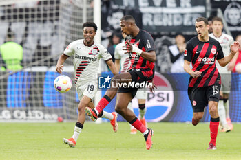 2024-05-05 - Willian Pacho of Frankfurt and Nathan Tella of Leverkusen during the German championship Bundesliga football match between Eintracht Frankfurt and Bayer 04 Leverkusen on May 5, 2024 at Deutsche Bank Park in Frankfurt, Germany - FOOTBALL - GERMAN CHAMP - FRANKFURT V LEVERKUSEN - GERMAN BUNDESLIGA - SOCCER