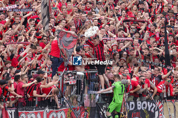 2024-05-18 - Bayer Leverkusen fans with goalkeeper Lukas Hradecky celebrating the German championship title after the German championship Bundesliga football match between Bayer 04 Leverkusen and FC Augsburg on May 18, 2024 at BayArena in Leverkusen, Germany - FOOTBALL - GERMAN CHAMP - LEVERKUSEN V AUGSBURG - GERMAN BUNDESLIGA - SOCCER