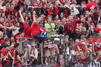 2024-05-18 - Bayer Leverkusen fans with goalkeeper Lukas Hradecky celebrating the German championship title after the German championship Bundesliga football match between Bayer 04 Leverkusen and FC Augsburg on May 18, 2024 at BayArena in Leverkusen, Germany - FOOTBALL - GERMAN CHAMP - LEVERKUSEN V AUGSBURG - GERMAN BUNDESLIGA - SOCCER