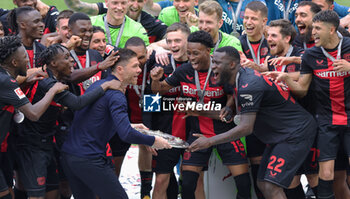 2024-05-18 - Bayer Leverkusen players with head coach Xabi Alonso celebrating the German championship title after the German championship Bundesliga football match between Bayer 04 Leverkusen and FC Augsburg on May 18, 2024 at BayArena in Leverkusen, Germany - FOOTBALL - GERMAN CHAMP - LEVERKUSEN V AUGSBURG - GERMAN BUNDESLIGA - SOCCER