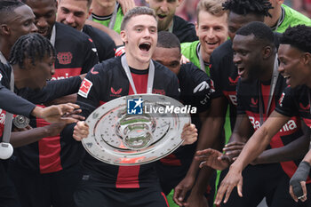 2024-05-18 - Bayer Leverkusen players with Florian Wirtz celebrating the German championship title after the German championship Bundesliga football match between Bayer 04 Leverkusen and FC Augsburg on May 18, 2024 at BayArena in Leverkusen, Germany - FOOTBALL - GERMAN CHAMP - LEVERKUSEN V AUGSBURG - GERMAN BUNDESLIGA - SOCCER