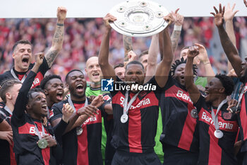 2024-05-18 - Bayer Leverkusen players with Jonathan Tah celebrating the German championship title after the German championship Bundesliga football match between Bayer 04 Leverkusen and FC Augsburg on May 18, 2024 at BayArena in Leverkusen, Germany - FOOTBALL - GERMAN CHAMP - LEVERKUSEN V AUGSBURG - GERMAN BUNDESLIGA - SOCCER