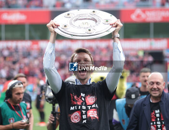 2024-05-18 - Bayer Leverkusen manager Simon Rolfes celebrates the German championship title after the German championship Bundesliga football match between Bayer 04 Leverkusen and FC Augsburg on May 18, 2024 at BayArena in Leverkusen, Germany - FOOTBALL - GERMAN CHAMP - LEVERKUSEN V AUGSBURG - GERMAN BUNDESLIGA - SOCCER