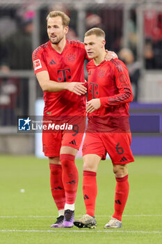 2024-11-22 - Harry Kane, Joshua Kimmich of Bayern Munich during the German championship Bundesliga football match between Bayern Munich and Augsburg on 22 November 2024 at Allianz Arena in Munich, Germany - FOOTBALL - GERMAN CHAMP - BAYERN MUNICH V AUGSBURG - GERMAN BUNDESLIGA - SOCCER