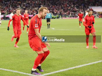 2024-11-22 - Harry Kane of Bayern Munich celebrates his goal 3-0 during the German championship Bundesliga football match between Bayern Munich and Augsburg on 22 November 2024 at Allianz Arena in Munich, Germany - FOOTBALL - GERMAN CHAMP - BAYERN MUNICH V AUGSBURG - GERMAN BUNDESLIGA - SOCCER