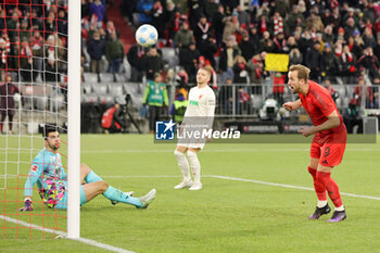 2024-11-22 - Harry Kane of Bayern Munich scores a goal 3-0 during the German championship Bundesliga football match between Bayern Munich and Augsburg on 22 November 2024 at Allianz Arena in Munich, Germany - FOOTBALL - GERMAN CHAMP - BAYERN MUNICH V AUGSBURG - GERMAN BUNDESLIGA - SOCCER