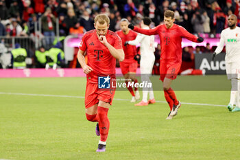 2024-11-22 - Harry Kane of Bayern Munich celebrates his goal 2-0 during the German championship Bundesliga football match between Bayern Munich and Augsburg on 22 November 2024 at Allianz Arena in Munich, Germany - FOOTBALL - GERMAN CHAMP - BAYERN MUNICH V AUGSBURG - GERMAN BUNDESLIGA - SOCCER