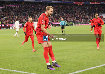 2024-11-22 - Harry Kane of Bayern Munich celebrates his goal 3-0 during the German championship Bundesliga football match between Bayern Munich and Augsburg on 22 November 2024 at Allianz Arena in Munich, Germany - FOOTBALL - GERMAN CHAMP - BAYERN MUNICH V AUGSBURG - GERMAN BUNDESLIGA - SOCCER