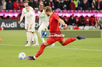 2024-11-22 - Harry Kane of Bayern Munich scores a penalty 2-0 during the German championship Bundesliga football match between Bayern Munich and Augsburg on 22 November 2024 at Allianz Arena in Munich, Germany - FOOTBALL - GERMAN CHAMP - BAYERN MUNICH V AUGSBURG - GERMAN BUNDESLIGA - SOCCER