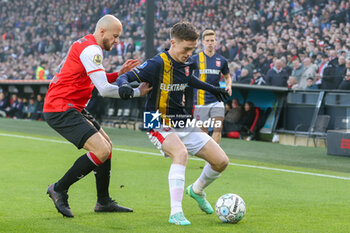 2024-01-28 - Daan Rotsof FC Twente is challenged by Gernot Trauner of Feyenoord during the Netherlands championship Eredivisie football match between Feyenoord and FC Twente on January 28, 2024 at Stadion Feyenoord in Rotterdam, Netherlands - FOOTBALL - NETHERLANDS CHAMP - FEYENOORD V TWENTE - NETHERLANDS EREDIVISIE - SOCCER