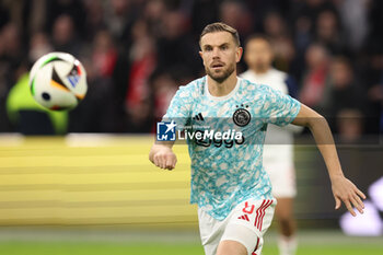 2024-02-03 - Jordan Henderson of Ajax warms up during the Netherlands championship Eredivisie football match between AFC Ajax and PSV on February 3, 2024 at Johan Cruijff ArenA in Amsterdam, Netherlands - FOOTBALL - NETHERLANDS CHAMP - AJAX V PSV - NETHERLANDS EREDIVISIE - SOCCER