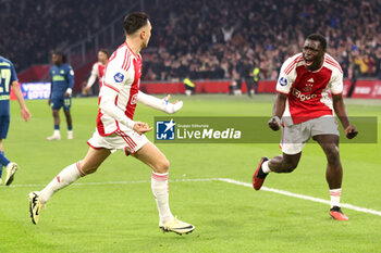 2024-02-03 - Steven Berghuis of Ajax celebrates his goal with Brian Brobbey 1-0 during the Netherlands championship Eredivisie football match between AFC Ajax and PSV on February 3, 2024 at Johan Cruijff ArenA in Amsterdam, Netherlands - FOOTBALL - NETHERLANDS CHAMP - AJAX V PSV - NETHERLANDS EREDIVISIE - SOCCER