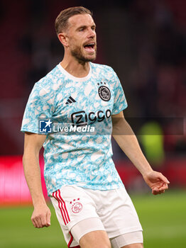 2024-02-03 - Jordan Henderson of Ajax warms up during the Netherlands championship Eredivisie football match between AFC Ajax and PSV on February 3, 2024 at Johan Cruijff ArenA in Amsterdam, Netherlands - FOOTBALL - NETHERLANDS CHAMP - AJAX V PSV - NETHERLANDS EREDIVISIE - SOCCER