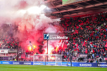 2024-02-25 - Fans and supporters of AZ Alkmaar using fireworks during the Netherlands championship Eredivisie football match between AZ and AFC Ajax on February 25, 2024 at AFAS Stadion in Alkmaar, Netherlands - FOOTBALL - NETHERLANDS CHAMP - AZ V AJAX - NETHERLANDS EREDIVISIE - SOCCER