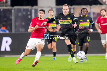 2024-10-19 - Rick Karsdorp of PSV and Mayckel Lahdo of AZ Alkmaar during the Netherlands championship, Eredivisie football match between AZ Alkmaar and PSV Eindhoven on October 19, 2024 at AFAS Stadion in Alkmaar, Netherlands - FOOTBALL - NETHERLANDS CHAMP - AZ V PSV - NETHERLANDS EREDIVISIE - SOCCER