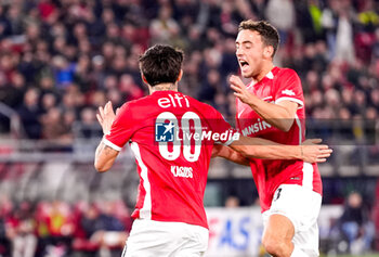 2024-10-19 - Denso Kasius of AZ Alkmaar celebrates after scoring his teams first goal, Zico Buurmeester of AZ Alkmaar during the Netherlands championship, Eredivisie football match between AZ Alkmaar and PSV Eindhoven on October 19, 2024 at AFAS Stadion in Alkmaar, Netherlands - FOOTBALL - NETHERLANDS CHAMP - AZ V PSV - NETHERLANDS EREDIVISIE - SOCCER