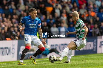 2024-04-07 - James Tavernier of Rangers FC and Diazen Maeda of Celtic FC during the Scottish championship, Cinch Premiership football match between Rangers and Celtic on 7 April 2024 at Ibrox in Glasgow, Scotland - FOOTBALL - SCOTTISH CHAMP - RANGERS V CELTIC - SCOTTISH PREMIERSHIP - SOCCER