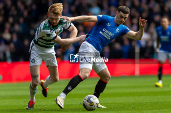 2024-04-07 - Scott Wright of Rangers FC and Liam Scales of Celtic FC during the Scottish championship, Cinch Premiership football match between Rangers and Celtic on 7 April 2024 at Ibrox in Glasgow, Scotland - FOOTBALL - SCOTTISH CHAMP - RANGERS V CELTIC - SCOTTISH PREMIERSHIP - SOCCER