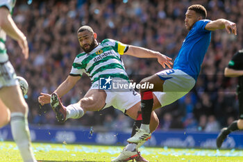 2024-04-07 - Cameron Carter-Vickers of Celtic FC and Cyriel Dessers of Rangers FC during the Scottish championship, Cinch Premiership football match between Rangers and Celtic on 7 April 2024 at Ibrox in Glasgow, Scotland - FOOTBALL - SCOTTISH CHAMP - RANGERS V CELTIC - SCOTTISH PREMIERSHIP - SOCCER