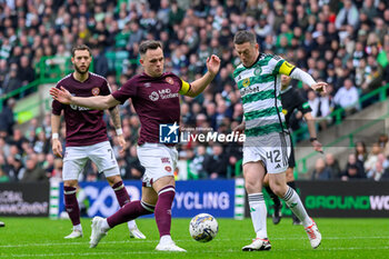 04/05/2024 - Lawrence Shankland of Hearts closes down Callum McGregor of Celtic during the Scottish championship Premiership football match between Celtic and Heart of Midlothian on 4 May 2024 at Celtic Park IN Glasgow, Scotland - FOOTBALL - SCOTTISH CHAMP - CELTIC V HEART OF MIDLOTHIAN - SCOTTISH PREMIERSHIP - CALCIO