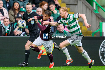 04/05/2024 - Kenneth Vargas of Hearts runs past Liam Scales of Celtic during the Scottish championship Premiership football match between Celtic and Heart of Midlothian on 4 May 2024 at Celtic Park IN Glasgow, Scotland - FOOTBALL - SCOTTISH CHAMP - CELTIC V HEART OF MIDLOTHIAN - SCOTTISH PREMIERSHIP - CALCIO