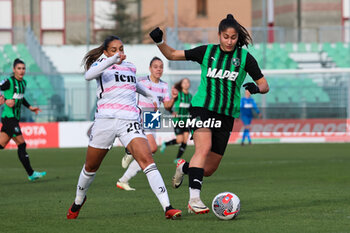 2024-01-21 - Estelle Cascarino of Juventus Women clashes with Chiara Beccari of Sassuolo Women during the Serie A Femminile match between Juventus Women and Sassuolo Women at Stadio Enzo Ricci Sassuolo on January 21, 2024 in Sassuolo, Italy. - US SASSUOLO VS JUVENTUS FC - ITALIAN SERIE A WOMEN - SOCCER