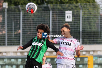 2024-01-21 - Kassandra Missipo os Sassuolo Women clashes with Arianna Caruso of Juventus Women during the Serie A Femminile match between Juventus Women and Sassuolo Women at Stadio Enzo Ricci Sassuolo on January 21, 2024 in Sassuolo, Italy. - US SASSUOLO VS JUVENTUS FC - ITALIAN SERIE A WOMEN - SOCCER