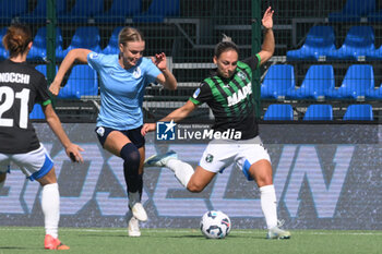 2024-09-20 - Matilde Lundorf of Napoli Femminile competes for the ball with Samantha Fisher of US Sassuolo Femminile during the Soccer- Italian Serie A Women between Napoli Femminile vs US Sassuolo at Arena Giuseppe Piccolo Stadium - NAPOLI FEMMINILE VS US SASSUOLO - ITALIAN SERIE A WOMEN - SOCCER