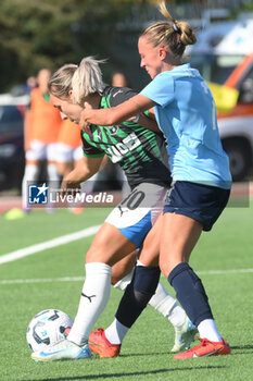 2024-09-20 - GinaChmielinski of US Sassuolo Femminile competes for the ball with Debora Novellino of Napoli Femminile during the Soccer- Italian Serie A Women between Napoli Femminile vs US Sassuolo at Arena Giuseppe Piccolo Stadium - NAPOLI FEMMINILE VS US SASSUOLO - ITALIAN SERIE A WOMEN - SOCCER