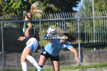 2024-09-20 - Sara Mella of US Sassuolo Femminile competes for the ball with Manuele sciabica of Napoli Femminile during the Soccer- Italian Serie A Women between Napoli Femminile vs US Sassuolo at Arena Giuseppe Piccolo Stadium - NAPOLI FEMMINILE VS US SASSUOLO - ITALIAN SERIE A WOMEN - SOCCER