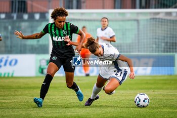 2024-09-28 - Kassandra Missipo of Sassuolo Women and Martina Tomaselli of Inter Women during the Women's Serie A match between Sassuolo Women and Inter Women at the Enzo Ricci Stadium in Sassuolo on September 28, 2024 in Sassuolo, Italy. - US SASSUOLO VS INTER - FC INTERNAZIONALE - ITALIAN SERIE A WOMEN - SOCCER