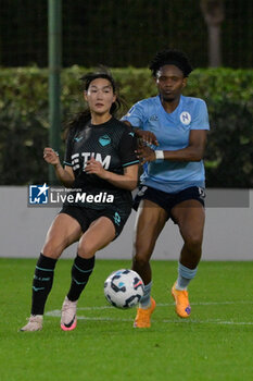 2024-10-13 - Lazio's Women Lina Yang and Olamide Adugbe (Napoli Femminile);  during the Italian Football Championship League A Women 2024/2025 match between SS Lazio Women vs Napoli Femminile at the on13 October 2024. - LAZIO WOMEN VS NAPOLI FEMMINILE - ITALIAN SERIE A WOMEN - SOCCER