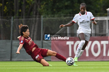 2024-10-20 - Saki Kumagai of A.S. Roma Femminile and Evelyn Ijeh of A.C. Milan Femminile in action during the 7th day of the Serie A Femminile eBay Championship between A.S. Roma and A.C. Milan Femminile at the Tre Fontane Stadium on October 20, 2024 in Rome, Italy. - AS ROMA VS AC MILAN - ITALIAN SERIE A WOMEN - SOCCER