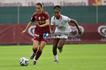 2024-10-20 - Lucia Di Guglielmo of A.S. Roma Femminile and Chante-Mary Dompig of A.C. Milan Femminile in action during the 7th day of the Serie A Femminile eBay Championship between A.S. Roma and A.C. Milan Femminile at the Tre Fontane Stadium on October 20, 2024 in Rome, Italy. - AS ROMA VS AC MILAN - ITALIAN SERIE A WOMEN - SOCCER