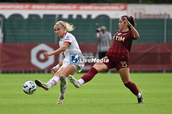 2024-10-20 - Emma Koivisto of A.C. Milan Femminile and Giulia Dragoni of A.S. Roma Femminile in action during the 7th day of the Serie A Femminile eBay Championship between A.S. Roma and A.C. Milan Femminile at the Tre Fontane Stadium on October 20, 2024 in Rome, Italy. - AS ROMA VS AC MILAN - ITALIAN SERIE A WOMEN - SOCCER