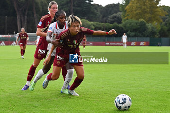 2024-10-20 - Moeka Minami of A.S. Roma Femminile and Evelyn Ijeh of A.C. Milan Femminile in action during the 7th day of the Serie A Femminile eBay Championship between A.S. Roma and A.C. Milan Femminile at the Tre Fontane Stadium on October 20, 2024 in Rome, Italy. - AS ROMA VS AC MILAN - ITALIAN SERIE A WOMEN - SOCCER