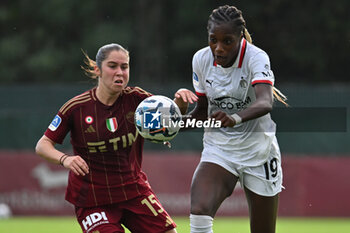 2024-10-20 - Giulia Dragoni of A.S. Roma Femminile and Evelyn Ijeh of A.C. Milan Femminile in action during the 7th day of the Serie A Femminile eBay Championship between A.S. Roma and A.C. Milan Femminile at the Tre Fontane Stadium on October 20, 2024 in Rome, Italy. - AS ROMA VS AC MILAN - ITALIAN SERIE A WOMEN - SOCCER