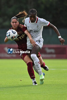 2024-10-20 - Giulia Dragoni of A.S. Roma Femminile and Evelyn Ijeh of A.C. Milan Femminile in action during the 7th day of the Serie A Femminile eBay Championship between A.S. Roma and A.C. Milan Femminile at the Tre Fontane Stadium on October 20, 2024 in Rome, Italy. - AS ROMA VS AC MILAN - ITALIAN SERIE A WOMEN - SOCCER