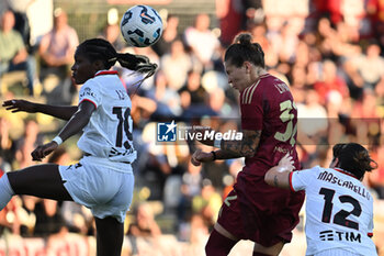 2024-10-20 - Evelyn Ijeh of A.C. Milan Femminile and Valentina Giacinti of A.S. Roma Femminile in action during the 7th day of the Serie A Femminile eBay Championship between A.S. Roma and A.C. Milan Femminile at the Tre Fontane Stadium on October 20, 2024 in Rome, Italy. - AS ROMA VS AC MILAN - ITALIAN SERIE A WOMEN - SOCCER