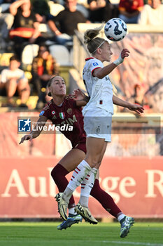 2024-10-20 - Sanne Troelsgaard of A.S. Roma Femminile and Emma Koivisto of A.C. Milan Femminile in action during the 7th day of the Serie A Femminile eBay Championship between A.S. Roma and A.C. Milan Femminile at the Tre Fontane Stadium on October 20, 2024 in Rome, Italy. - AS ROMA VS AC MILAN - ITALIAN SERIE A WOMEN - SOCCER