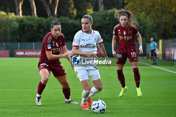 2024-10-20 - Evelyne Viens of A.S. Roma Femminile and Monica Renzotti of A.C. Milan Femminile and Benedetta Glionna of A.S. Roma Femminile in action during the 7th day of the Serie A Femminile eBay Championship between A.S. Roma and A.C. Milan Femminile at the Tre Fontane Stadium on October 20, 2024 in Rome, Italy. - AS ROMA VS AC MILAN - ITALIAN SERIE A WOMEN - SOCCER