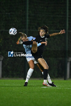 2024-11-02 - Federica D'Auria of S.S. Lazio and Ramona Petzelberger of F.C. Como Women in action during the 8th day of the Serie A Femminile eBay Championship between S.S. Lazio and F.C. Como at the Mirko Fersini Stadium on November 2, 2024 in Formello, Italy. - LAZIO WOMEN VS FC COMO WOMEN - ITALIAN SERIE A WOMEN - SOCCER