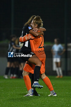 2024-11-02 - Berta Bou Salas and Astrid Gilardi of F.C. Como Women celebrates the gol of Dominika Skorvankova of F.C. Como Women during the 8th day of the Serie A Femminile eBay Championship between S.S. Lazio and F.C. Como at the Mirko Fersini Stadium on November 2, 2024 in Formello, Italy. - LAZIO WOMEN VS FC COMO WOMEN - ITALIAN SERIE A WOMEN - SOCCER