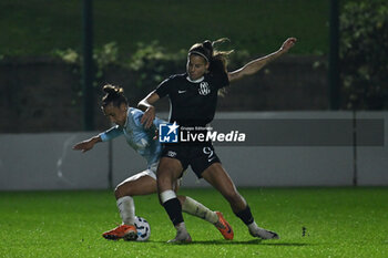 2024-11-02 - Elisabetta Oliviero of S.S. Lazio and Ramona Petzelberger of F.C. Como Women in action during the 8th day of the Serie A Femminile eBay Championship between S.S. Lazio and F.C. Como at the Mirko Fersini Stadium on November 2, 2024 in Formello, Italy. - LAZIO WOMEN VS FC COMO WOMEN - ITALIAN SERIE A WOMEN - SOCCER