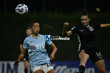 2024-11-02 - Eleonora Goldoni of S.S. Lazio and Chiara Cecotti of F.C. Como Women in action during the 8th day of the Serie A Femminile eBay Championship between S.S. Lazio and F.C. Como at the Mirko Fersini Stadium on November 2, 2024 in Formello, Italy. - LAZIO WOMEN VS FC COMO WOMEN - ITALIAN SERIE A WOMEN - SOCCER