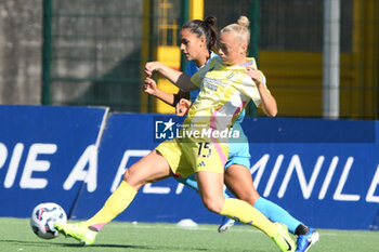 2024-11-03 - Hanna Ulaiha Bennison of Juventus FC competes for the ball with Melissa Bellucci of Napoli Femminile during the Soccer- Italian Serie A Women between Napoli Femminile vs Juventus FC at Arena Giuseppe Piccolo Stadium - NAPOLI FEMMINILE VS JUVENTUS FC - ITALIAN SERIE A WOMEN - SOCCER