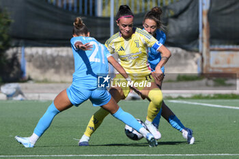 2024-11-03 - Virginia Di Giammarino of Napoli Femminile competes for the ball with Barbara Bonansea of Juventus FC during the Soccer- Italian Serie A Women between Napoli Femminile vs Juventus FC at Arena Giuseppe Piccolo Stadium - NAPOLI FEMMINILE VS JUVENTUS FC - ITALIAN SERIE A WOMEN - SOCCER