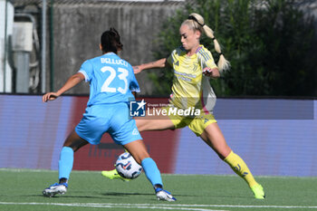 2024-11-03 - Asia Bragonzi of Juventus FC competes for the ball with Melissa Bellucci of Napoli Femminile during the Soccer- Italian Serie A Women between Napoli Femminile vs Juventus FC at Arena Giuseppe Piccolo Stadium - NAPOLI FEMMINILE VS JUVENTUS FC - ITALIAN SERIE A WOMEN - SOCCER