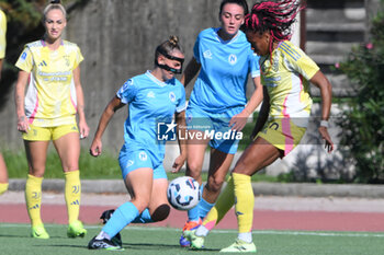 2024-11-03 - Chiara Beccari of Juventus FC competes for the ball with Michela Giordano of Napoli Femminile during the Soccer- Italian Serie A Women between Napoli Femminile vs Juventus FC at Arena Giuseppe Piccolo Stadium - NAPOLI FEMMINILE VS JUVENTUS FC - ITALIAN SERIE A WOMEN - SOCCER