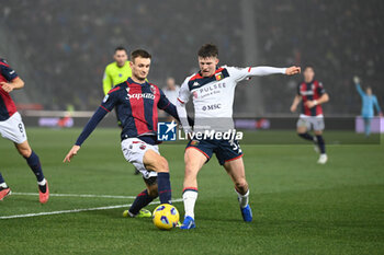 2024-01-05 - Stefan Posch (Bologna Fc) and Morten Frendrup (GenoaCFC) in action - BOLOGNA FC VS GENOA CFC - ITALIAN SERIE A - SOCCER